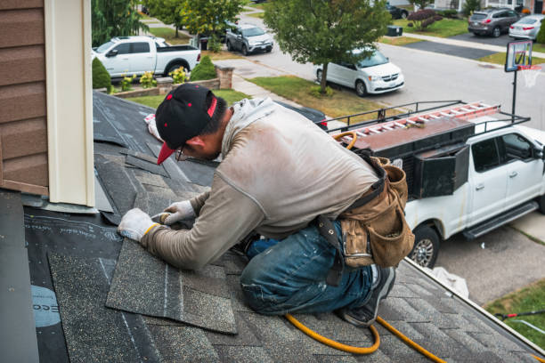 Professional Roofing technician working in Franktown, CO